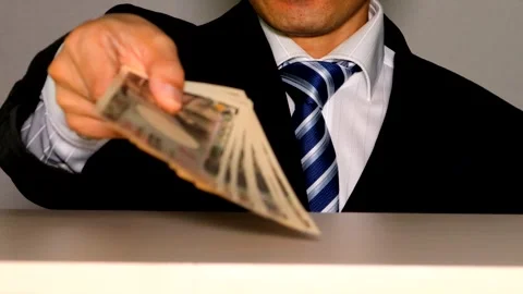 A businessman holding banknotes Video stock 335026683