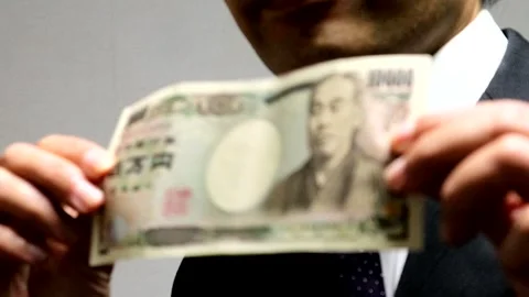 A businessman holding banknotes Stock Footage 335403262