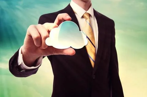 Businessman holding cloud computing icon Stock Photos