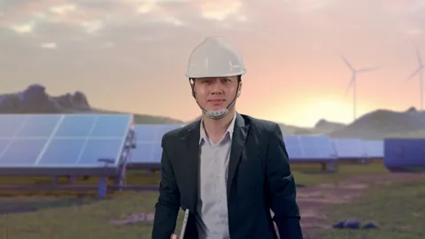 Businessman Holding Computer While Walking at Energy Farm Stock Footage 331021625