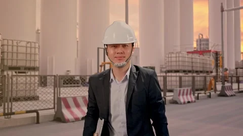 Businessman Holding Computer While Walking at Storage Facility Stock Footage 335075043