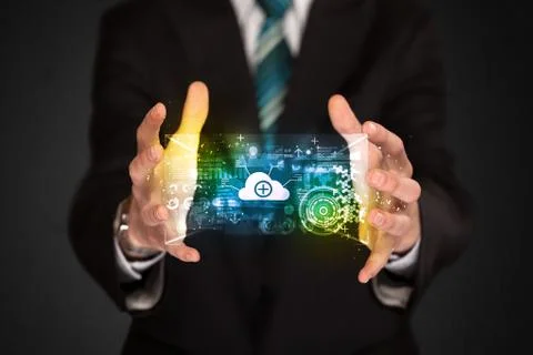 Businessman holding data cloud Stock Photos