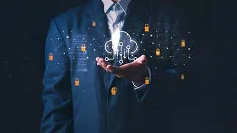 Businessman holding digital cloud with security icons 库存照片