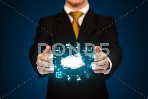 Businessman holding digital icons Stock Photos