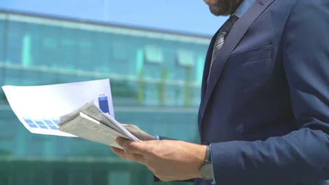 Businessman holding documents and checking data, steadycam shot  Stock Footage 97165485
