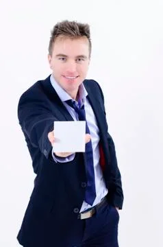 Businessman holding an empty note Stock Photos