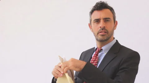 Businessman holding envelope with documents Stock Footage 40541118