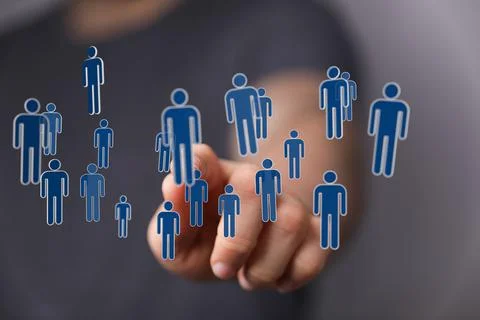 Businessman holding a floating digital render of profile icons-networking concep Stock Photos