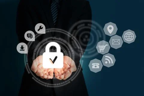 Businessman holding a floating render of cybersecurity lock icons Stock Illustration