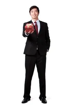 Businessman Holding a Gift Stock Photos