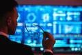 The businessman holding glasses on the screen background Photo