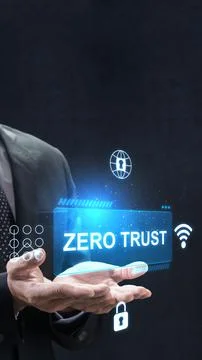 Businessman holding a glowing virtual interface with Zero Trust cybersecuri.. Stock Photos
