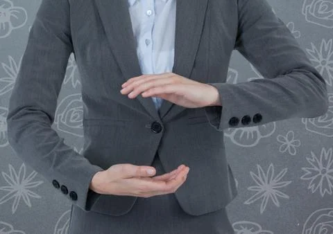 Businessman holding invisible object with pattern background Stock Photos