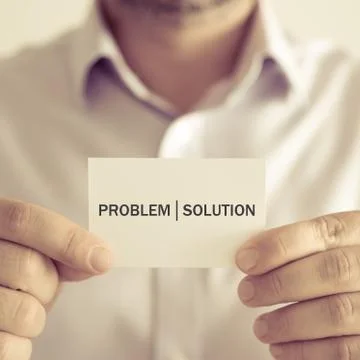 Businessman holding PROBLEM SOLUTION message card Stock Photos