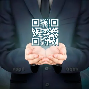 Businessman holding QR code icon Stock Illustration