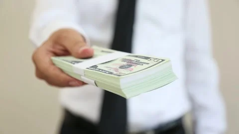 Businessman Holding Stack of Dollar Bills Stock Footage 340901417