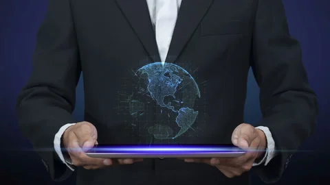 Businessman holding tablet computer with blue digital hologram of world Stock Footage 132732235