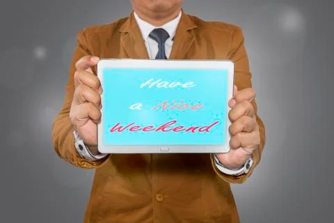 Businessman holding tablet computer Stock Illustration