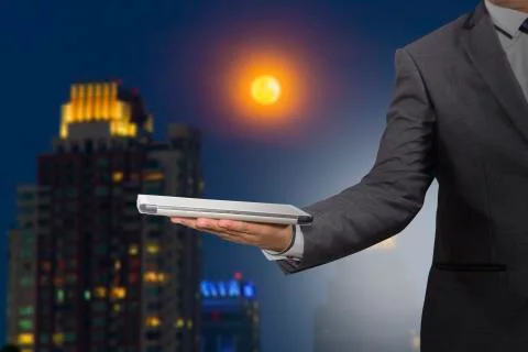 Businessman  holding a tablet computer Stock Illustration