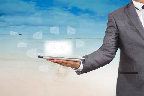 Businessman  holding a tablet computer Stock Illustration