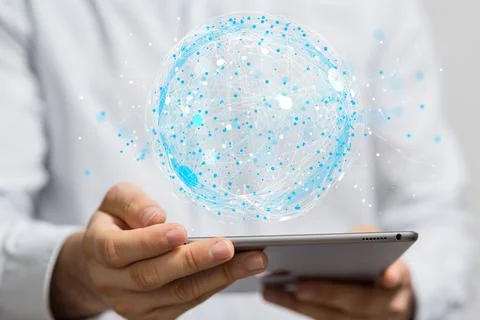 Businessman holding a tablet with a floating render of a blue global network Stock Photos