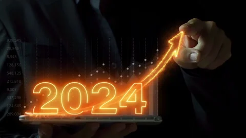 Businessman holding tablet with virtual increasing technical graph and up arrow Stock Footage 252345835