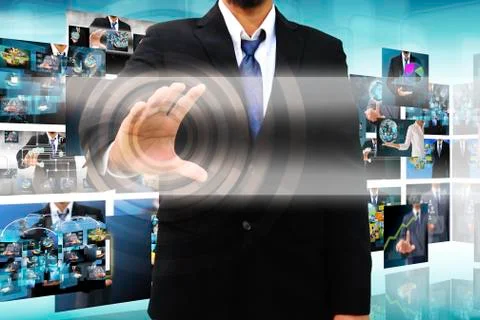 Businessman holding a touch screen interface 스톡 일러스트