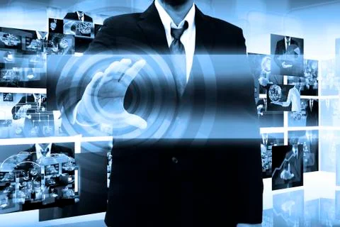 Businessman holding a touch screen interface Stock Illustration
