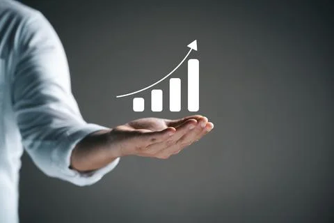 Businessman holding virtual graph, graph analysis of business growth and in.. Stock Photos