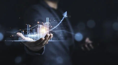 Businessman holding virtual technical graph and chart for analysis Stock Photos