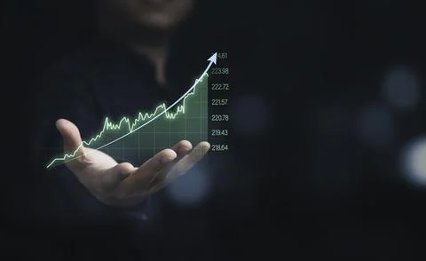Businessman holding virtual technical graph and chart for analysis stock ma.. Stock Photos