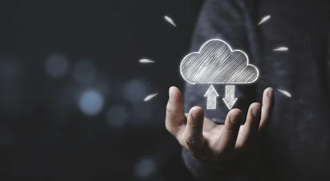 Businessman holding white cloud computing icon from hand drawing Foto stock