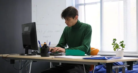 Businessman in a hurry to complete work at the computer Stock Footage 146902565