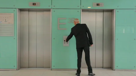 Businessman in hurry missing elevator TWO TAKES Stock Footage 492156