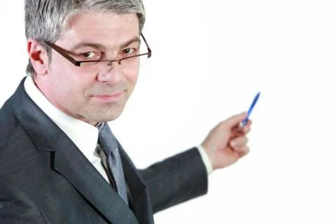 Businessman indicating Stock Photos
