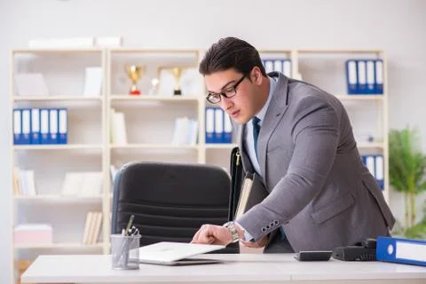 Businessman in industrial espionage concept Stock Photos