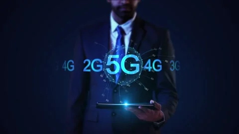 Businessman Interacting 5G Technology on a Digital Tablet Evolution of Wireless Stock Footage 311658992