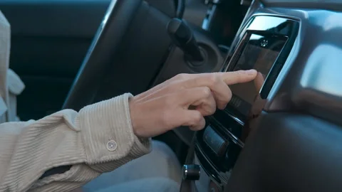 Businessman interacting with car navigation system Video stock 330132252