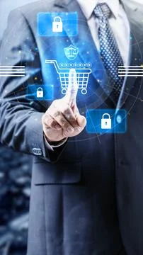 A businessman interacting with a virtual interface showing a shopping cart,.. Stock Photos