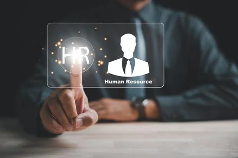 A businessman interacts with a virtual interface, Stock Photos