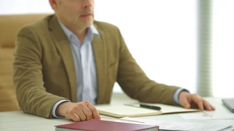 The businessman is interviewing at the table. slow motion Stock-Footage 105200460