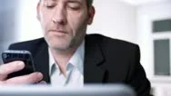 Businessman With Iphone Stock Footage