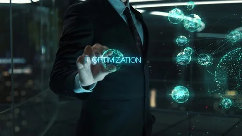 Businessman with IT Optimization hologram concept Stock Footage 121479058