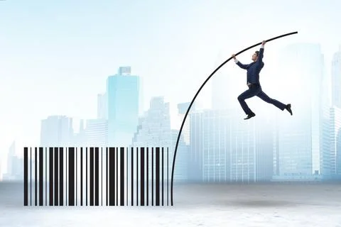 Businessman jumping over bar code in pole vaulting 写真素材