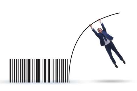 Businessman jumping over bar code in pole vaulting Foto stock