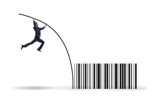 Businessman jumping over bar code in pole vaulting Foto stock