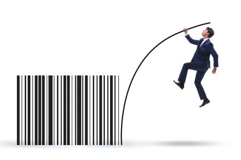 Businessman jumping over bar code in pole vaulting 写真素材