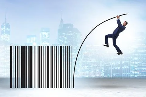 Businessman jumping over bar code in pole vaulting Foto stock
