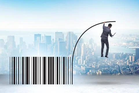 Businessman jumping over bar code in pole vaulting Stock-Fotos