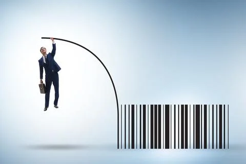 Businessman jumping over bar code in pole vaulting Foto stock